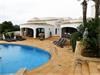 Villa with beautiful gardens and double pool.