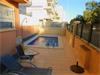 Appartement met garage, berging en zwembad