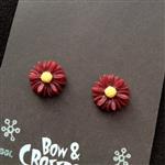 Bow and Crossbones, Burgundy Daisy Flower Stud Earrings.