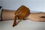 PICCOLINA Italiaans leren armband tas Cognac