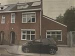 Halfvrijstaande woning met bedrijfsruimte 