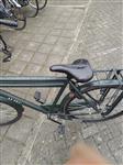 Herenfiets altec en fiets damesfiets Cortina 