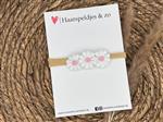 Baby haarbandje - elastiek - met madeliefjes - lichtroze - bloemen - bloemetjes