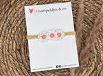 Baby haarbandje - elastiek - met madeliefjes - oranje/roze - bloemen - bloemetjes