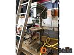Kolomboormachine, Slijptrommel met bankschroef