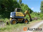 Komatsu PW95 mobiele graafmachine