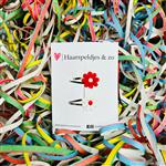 Klikklakspeldjes met rood/witte madeliefjes - carnaval - Ut Malse Arckeldurp — 4 cm