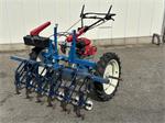 Hak schoffelmachine met Honda-motor