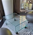 Glazen salontafel met wieltjes