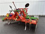 Kuhn rotorkopeg met ruggenvormer.