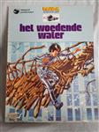 Afgeprijsd. Strip. Ravian. Nr. 1. Het woedende water. 1e druk 1973. Uitgeverij: Amsterdam Boek.