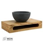 Natuursteen waskom rond op massief houten plankje