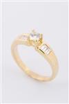 Gouden rij ring met een briljant en baguette geslepen diamanten