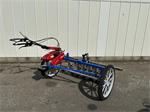 Honda F560  2 wielige trekker met Hak schoffelbalk