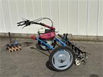 Honda F560  2 wielige trekker met Hak schoffelbalk