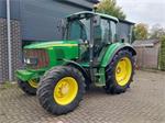 John Deere 6120 met superkruip