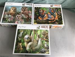 3 puzzels nieuw waarvan 1 open gemaakt 