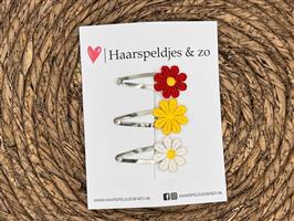 Oeteldonkse madeliefjes op klikklakspeldjes - carnaval — 4 cm