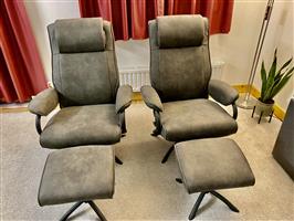 Twee als nieuwe Leren Draai Fauteuils 