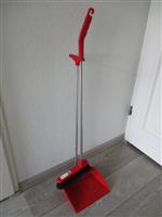 Stoffer met Lange Steel en Blik.