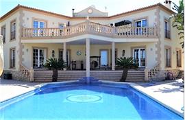 Large villa with valley, mountain and sea views.