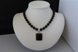 Gefacetteerde ONYX ketting/oorhanger-set