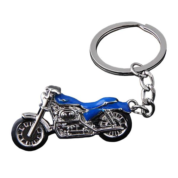 Grote foto sleutelhanger zilveren motor met blauw motoren kleding