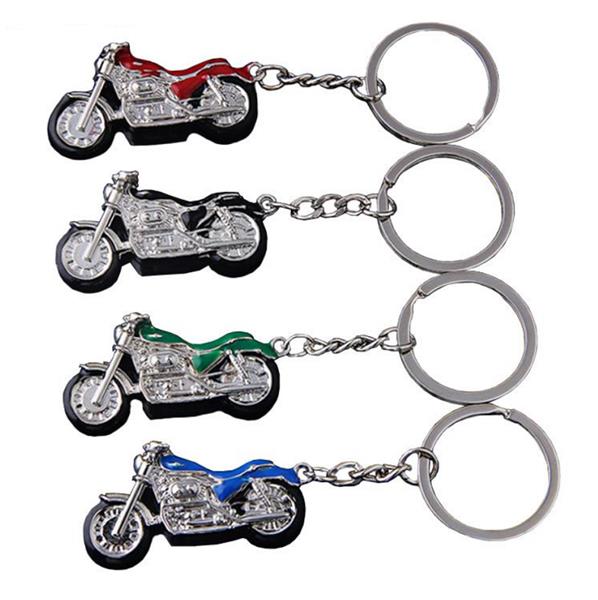 Grote foto sleutelhanger zilveren motor met blauw motoren kleding