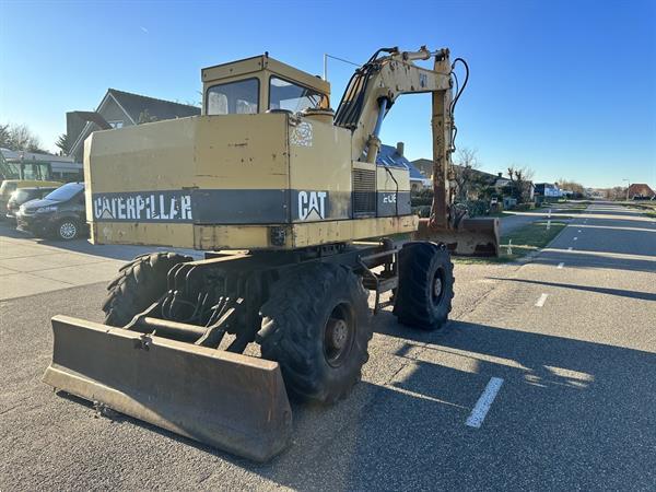 Grote foto caterpillar 206 doe het zelf en verbouw kranen en graafmachines
