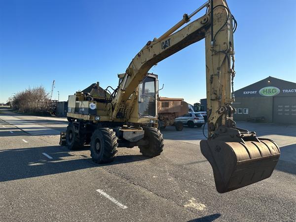 Grote foto caterpillar 206 doe het zelf en verbouw kranen en graafmachines