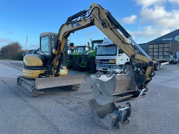 Grote foto caterpillar 304 gr doe het zelf en verbouw kranen en graafmachines