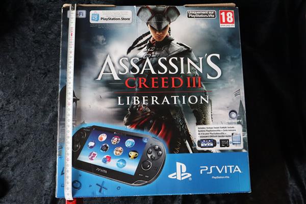 Grote foto assassin creed iii liberation promo game store shop standee display sign box ps vita spelcomputers games overige games