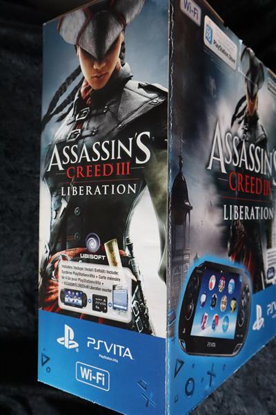 Grote foto assassin creed iii liberation promo game store shop standee display sign box ps vita spelcomputers games overige games