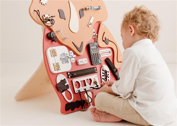 Grote foto sensorisch bord dino wandboard hangend kinderen en baby overige
