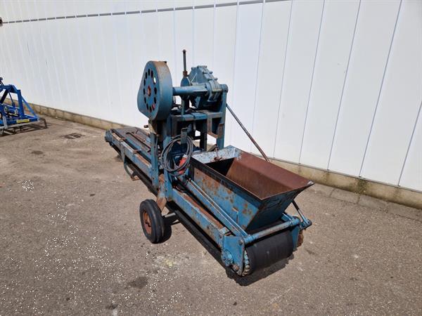 Grote foto visser dewa pottenpersmachine agrarisch tuinbouw