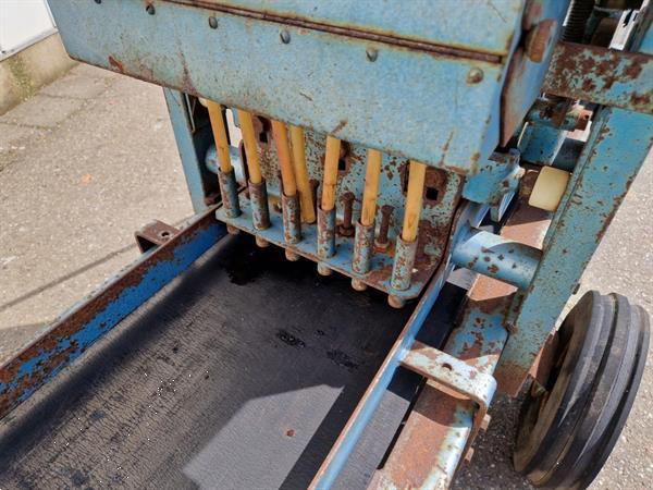 Grote foto visser dewa pottenpersmachine agrarisch tuinbouw