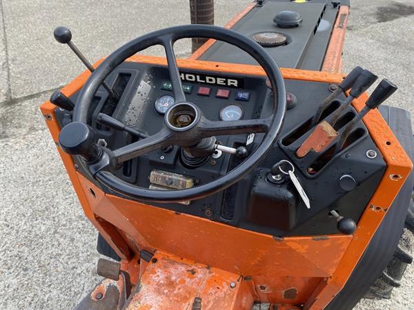 Grote foto holder c30 kniktractor hydrostaat agrarisch tractoren