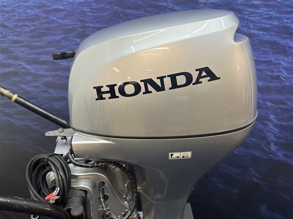 Grote foto honda 20 pk buitenboordmotor langstaart afstand bediend watersport en boten buiten en binnenboordmotoren