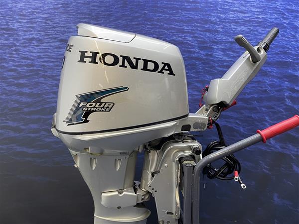 Grote foto honda 30 pk langstaart elektrische start. knuppel watersport en boten buiten en binnenboordmotoren