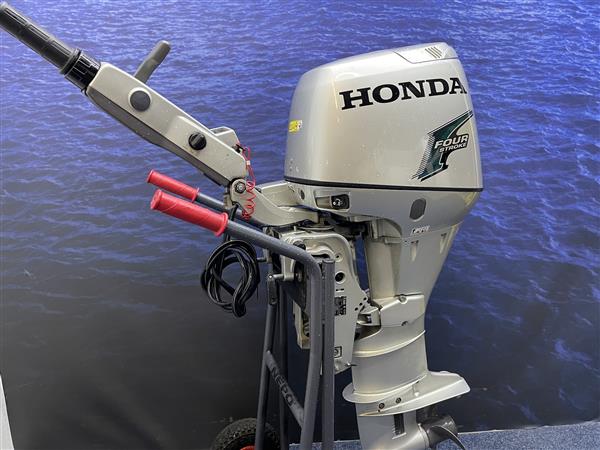 Grote foto honda 30 pk langstaart elektrische start. knuppel watersport en boten buiten en binnenboordmotoren