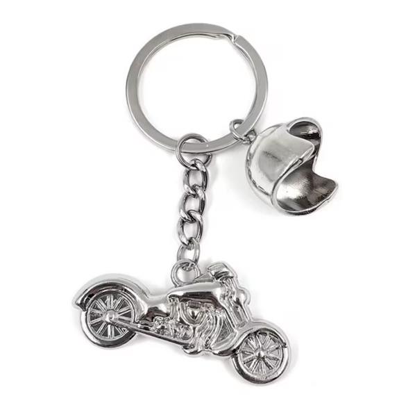 Grote foto sleutelhanger zilveren motor met jethelm motoren kleding