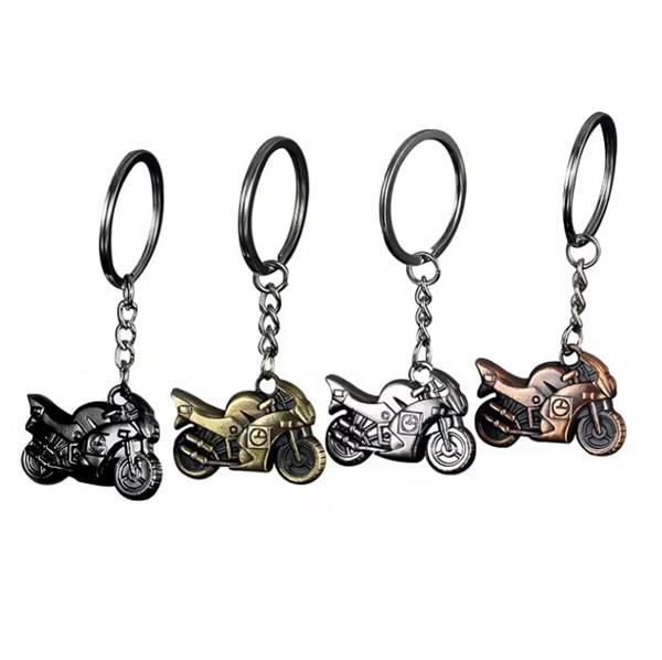 Grote foto sleutelhanger gouden buikschuiver motoren kleding