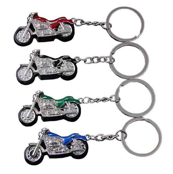 Grote foto sleutelhanger zilveren motor met groen motoren kleding