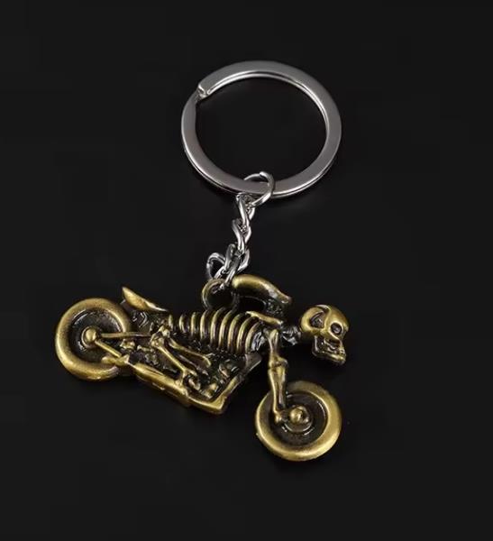 Grote foto sleutelhanger gouden spookrijder motorfiets motoren kleding