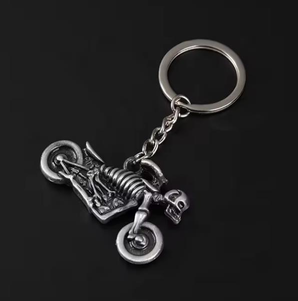 Grote foto sleutelhanger zilveren spookrijder motorfiets motoren kleding