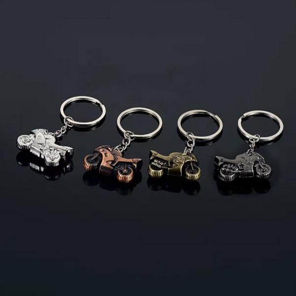 Grote foto sleutelhanger zilveren buikschuiver motoren kleding