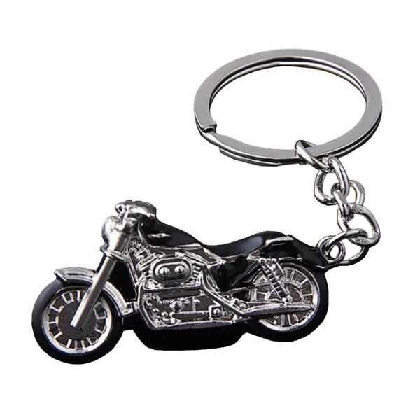 Grote foto sleutelhanger zwart met zilveren motor motoren kleding