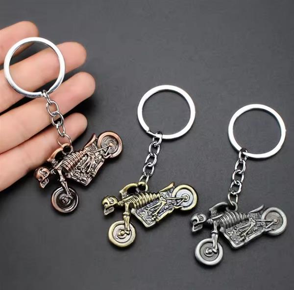 Grote foto sleutelhanger koperen spookrijder motorfiets motoren kleding