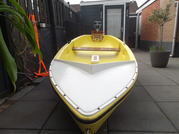 Grote foto roei motorbootje watersport en boten roeiboten