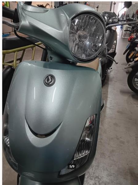 Grote foto opknapper sym fiddle met weinig km fietsen en brommers scooters
